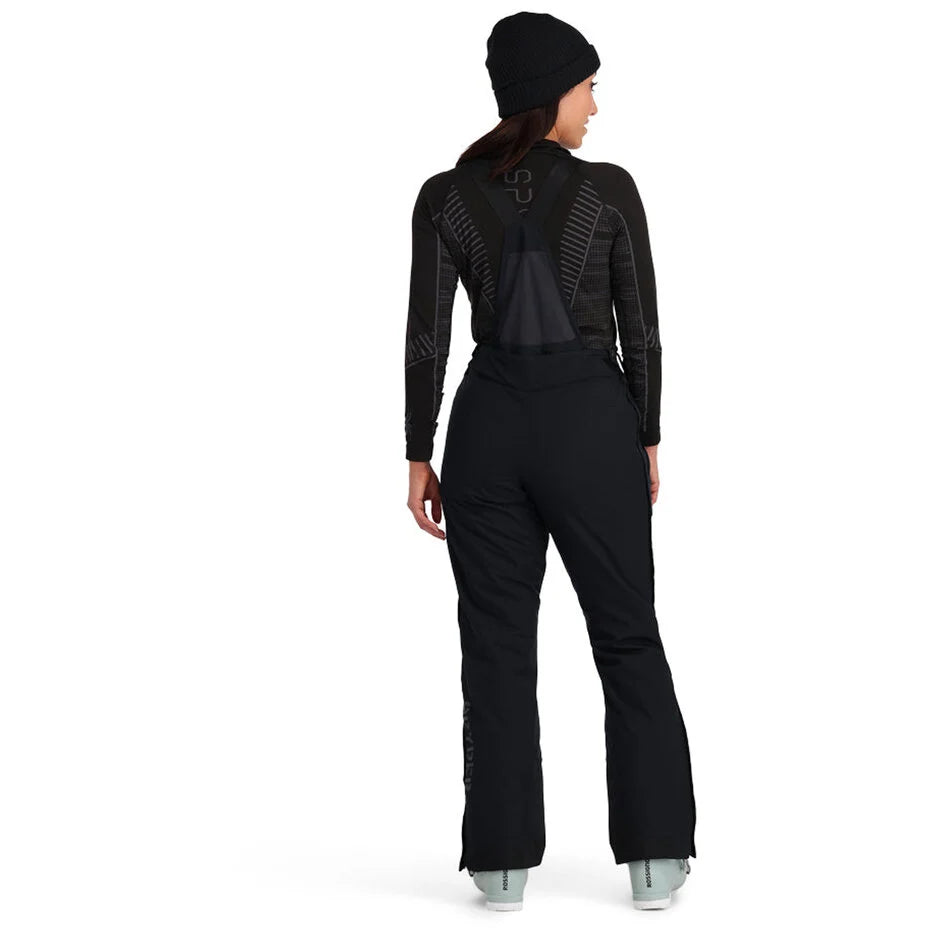 Spyder Women's Tarantula Full Zip Ski Pants featuring full-length side zippers, lightweight insulation, weather-resistant fabric, and a women's-specific race fit.