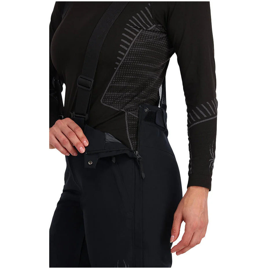 Spyder Women's Tarantula Full Zip Ski Pants featuring full-length side zippers, lightweight insulation, weather-resistant fabric, and a women's-specific race fit.