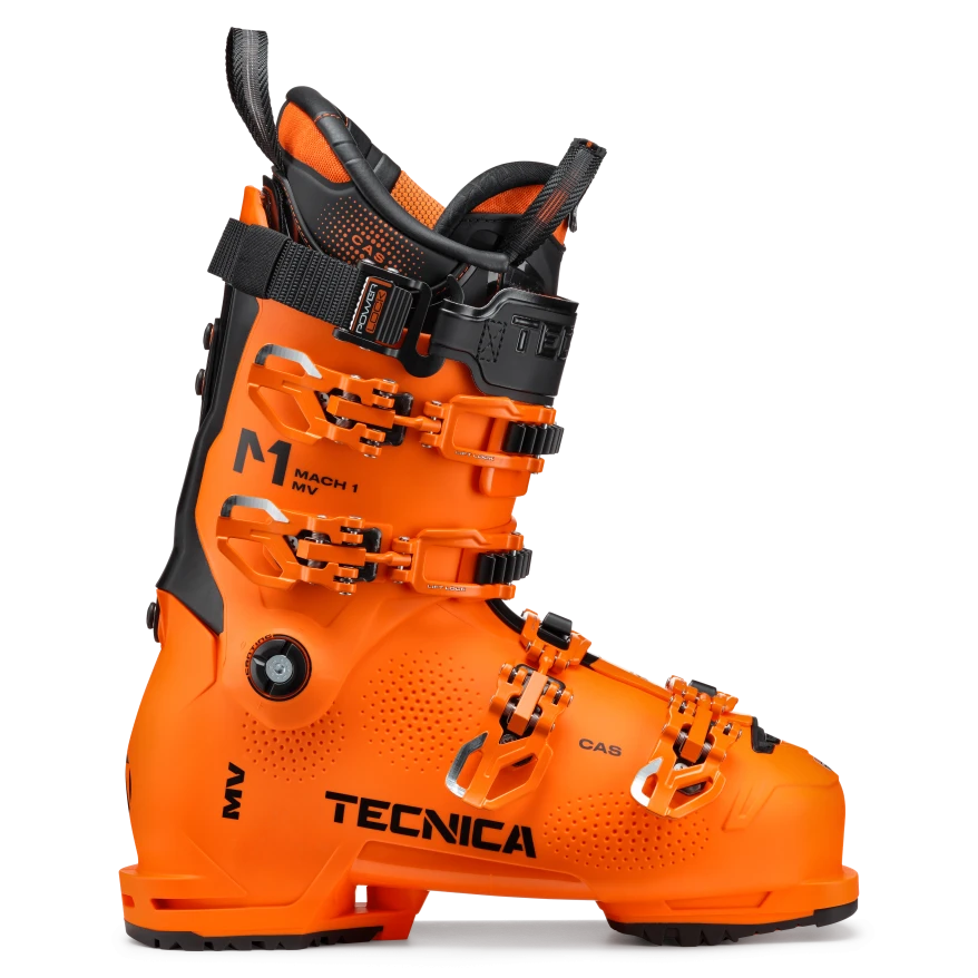 An orange and black Tecnica Mach 1 130 MV ski boot that features a very stiff 130 flex and GripWalk soles.