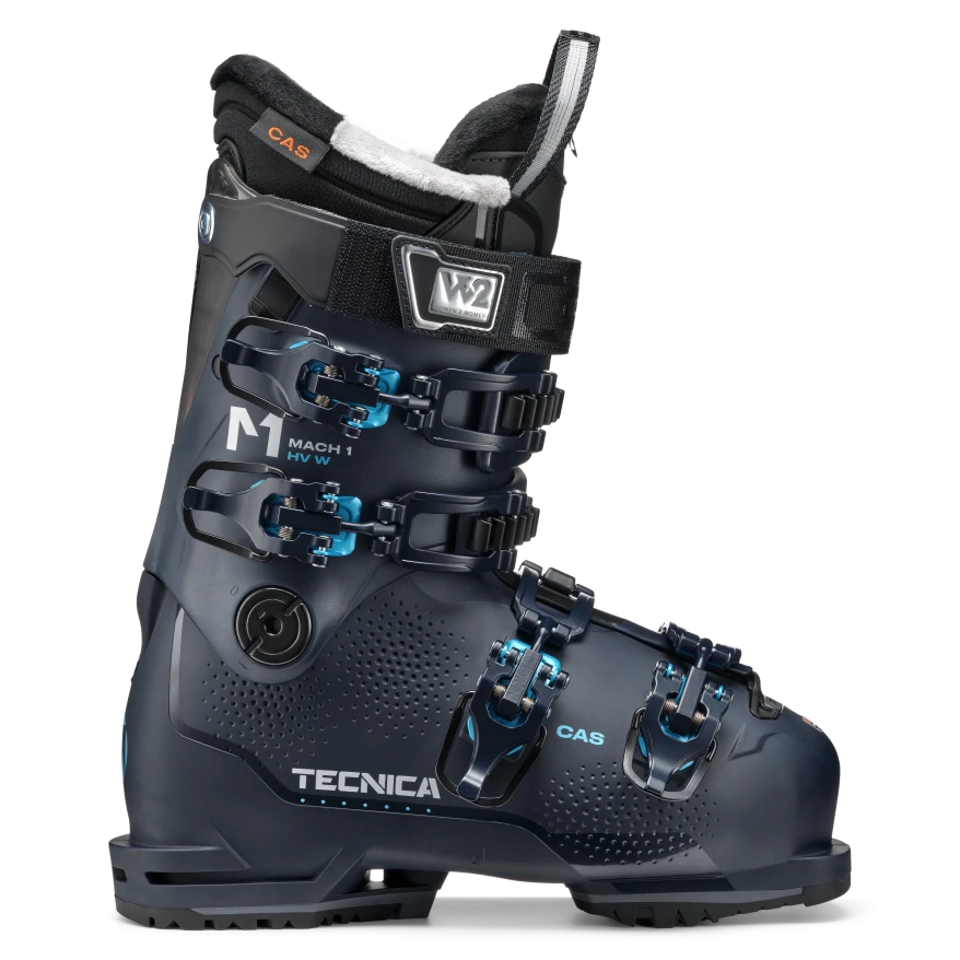 A navy blue Tecnica Mach 1 95 HV ski boot that is designed for women and feature GripWalk soles.