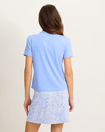Tommy Bahama Women's Abby Short Sleeve Polo featuring breathable stretch fabric, classic polo styling, and a flattering feminine fit.
