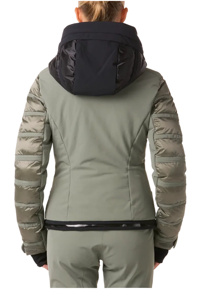 Toni Sailer Women’s Swinta Splendid Jacket showing 4-way stretch fabric with shiny jet-fabric accents, high-loft insulation baffles, YKK AquaGuard water-repellent zippers, forearm ski pass pocket, and elastic wrist gaiters with thumbholes.
