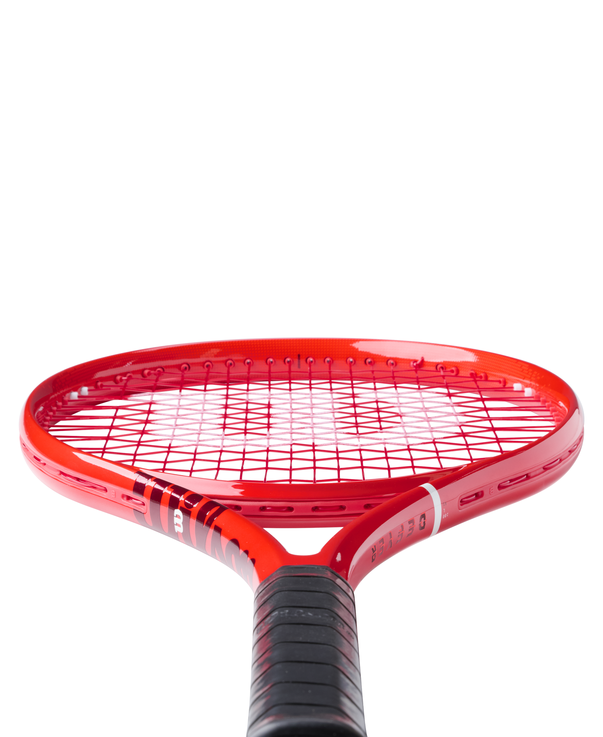 A red Wilson Defyer 100L V1 tennis racket that features a lightweight design and is designed for spin.