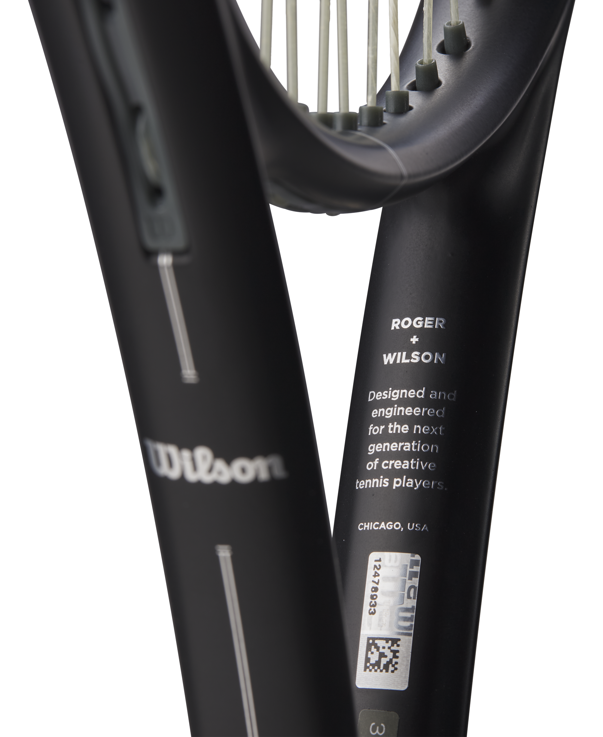 A Wilson RF 01 Future tennis racket with a black and silver color scheme, featuring an RF Roger Federer logo