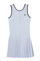 Lacoste Women's Ultra-Dry Stretch Tennis Dress, Lacoste Women's Tennis Shorts, women's tennis clothing, ultra-dry fabric, stretch tennis dress, stretch tennis shorts, tennis apparel, tennis gear, women's sportswear, breathable tennis dress, moisture-wicking tennis dress, high-performance tennis wear, tennis outfit, Swiss Sports Haus, West Vancouver tennis shop, tennis dress and shorts set, stylish tennis apparel, Lacoste tennis clothing.