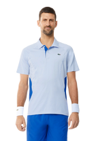 Lacoste Men's Tennis x Novak Djokovic Fan Version Polo, tennis polo shirt, Novak Djokovic polo, Lacoste tennis apparel, high-quality tennis wear, breathable tennis polo, classic collar polo, button placket polo, Lacoste crocodile logo, men's tennis clothing, Swiss Sports Haus, West Vancouver sports shop, tennis gear, tennis fashion.