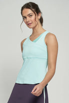 LIJA Elite Lily Tank, tennis tank top, tennis clothing, athletic wear, moisture-wicking tank, breathable mesh tank, stylish tennis top, fitted tank top, tennis gear, performance wear, Swiss Sports Haus, West Vancouver sports store.