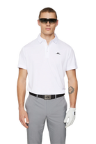 J.Lindeberg Men's Peat Regular Polo, golf polo, men's golf apparel, breathable polo shirt, moisture-wicking fabric, classic fit polo, stylish golf wear, golf clothing, casual wear, Swiss Sports Haus, West Vancouver golf shop, golf shirt, high-quality polo, J.Lindeberg polo, men's fashion.