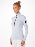 Toni Sailer Women's Wieka T-Neck, women's turtleneck, ski clothing, winter sports apparel, fitted turtleneck, zip-up collar, moisture-wicking fabric, base layer, warm turtleneck, comfortable ski wear, skiing gear, winter sports gear, ski shop, stylish base layer, luxury ski wear, Toni Sailer, Swiss Sports Haus, West Vancouver ski shop.