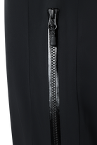 A close-up of the sealed zipper on a pair of black Bogner Fire + Ice Nic-T Ski Pants that feature 20K waterproofing and 20K breathability, a premium 4-way stretch technical fabric, and a sleek silhouette.