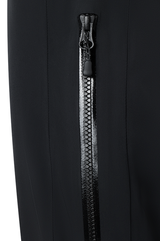 A close-up of the sealed zipper on a pair of black Bogner Fire + Ice Nic-T Ski Pants that feature 20K waterproofing and 20K breathability, a premium 4-way stretch technical fabric, and a sleek silhouette.