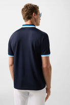 Bogner Men's Arik short-sleeved golf polo with breathable stretch performance fabric and athletic fit for golf and everyday wear