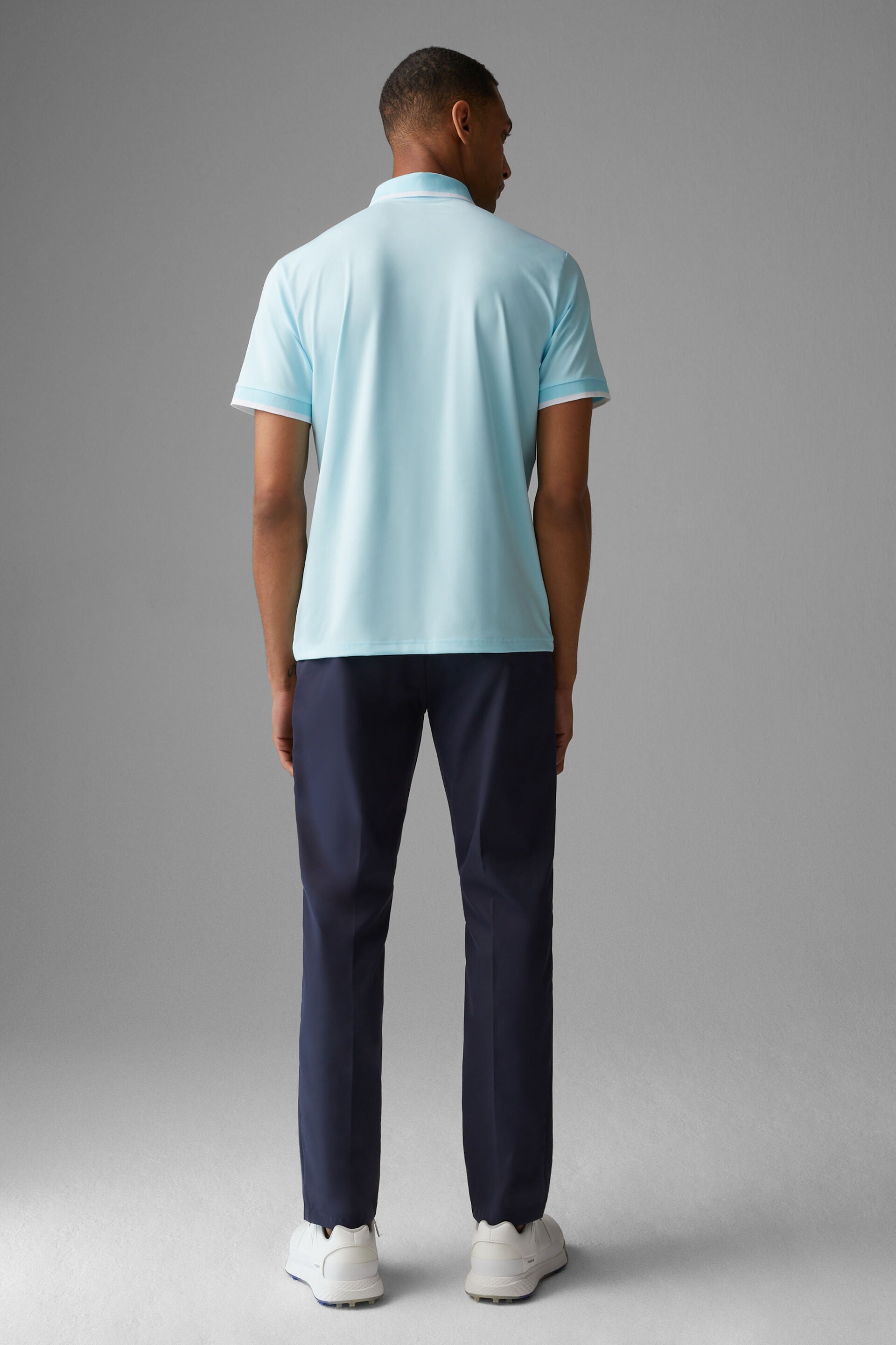 Bogner Men's Cody golf polo with breathable stretch performance fabric and athletic fit for golf and resort wear