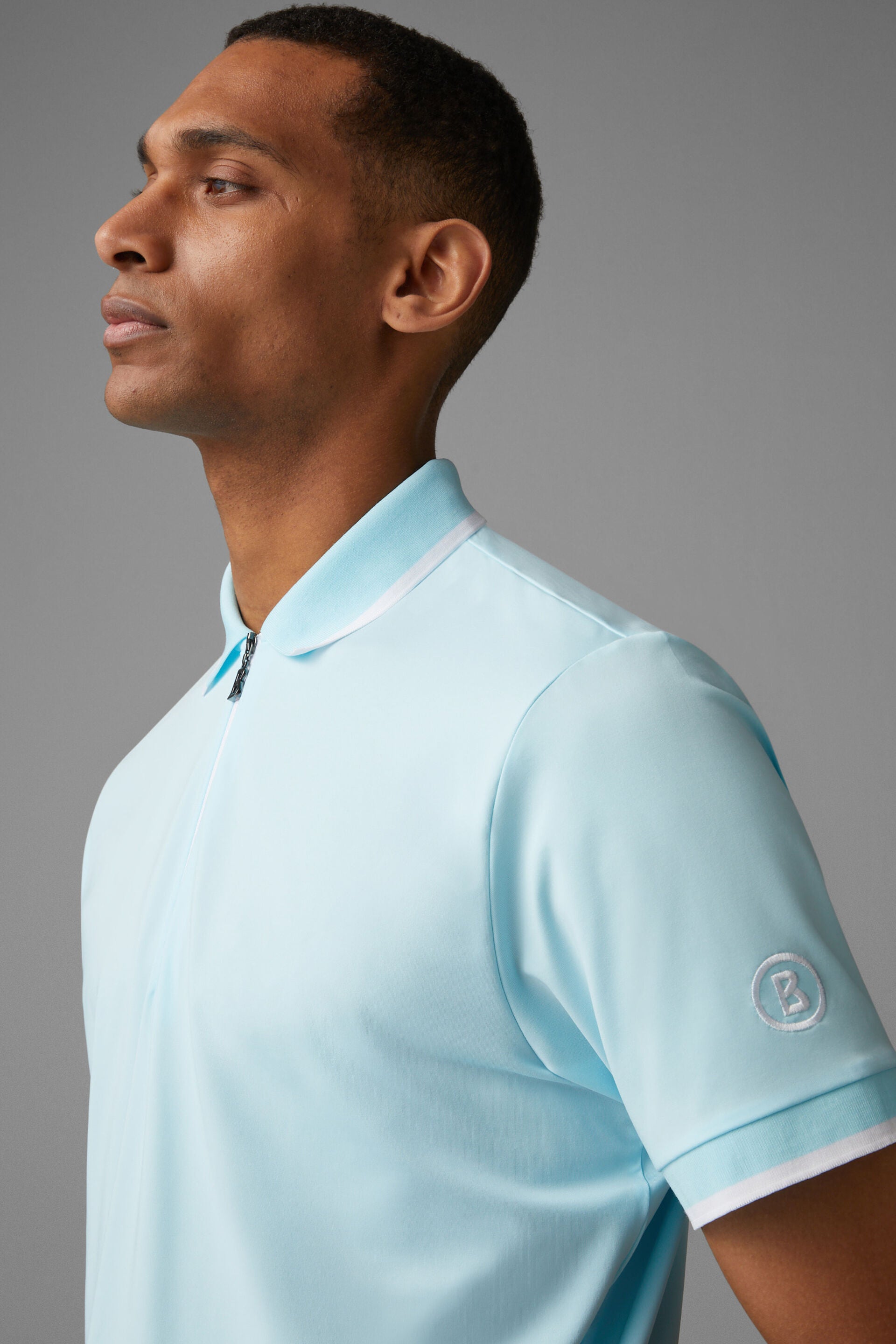 Bogner Men's Cody golf polo with breathable stretch performance fabric and athletic fit for golf and resort wear