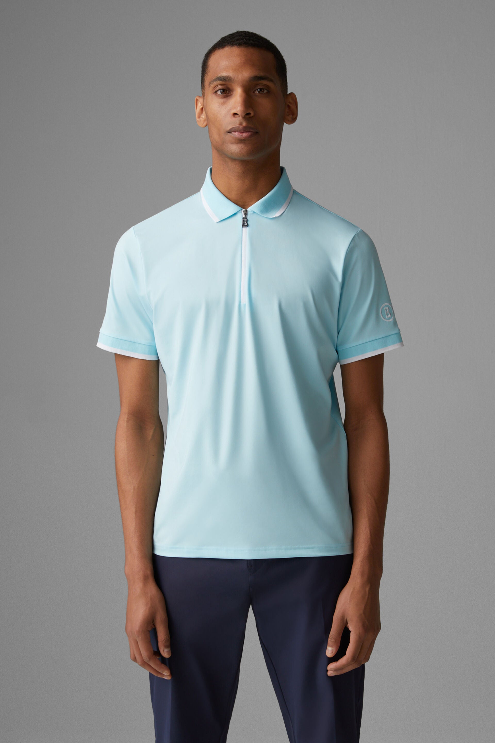 Bogner Men's Cody golf polo with breathable stretch performance fabric and athletic fit for golf and resort wear