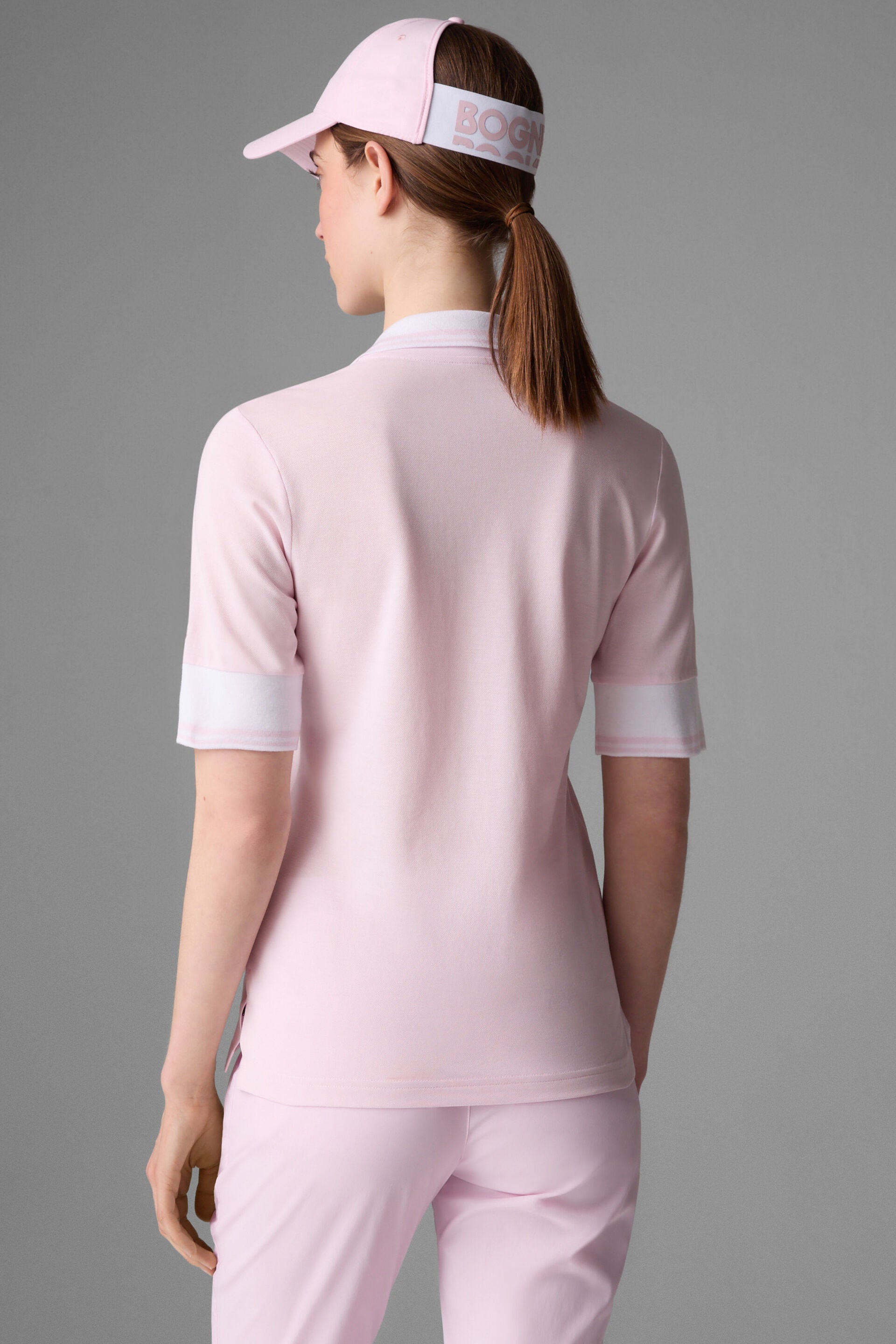 Bogner Women's Elonie golf polo with breathable stretch performance fabric and tailored fit for golf and resort wear