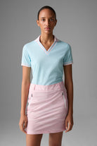 Bogner Women's Lydia golf polo with breathable stretch performance fabric and tailored fit for golf and resort wear