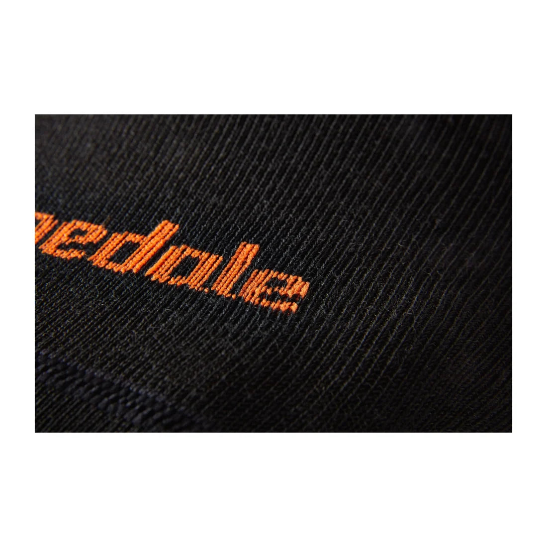 Bridgedale Men's Ski Race Performance Over Calf sock in Black/Orange with ultra-thin, low-bulk construction for a precise ski boot fit.