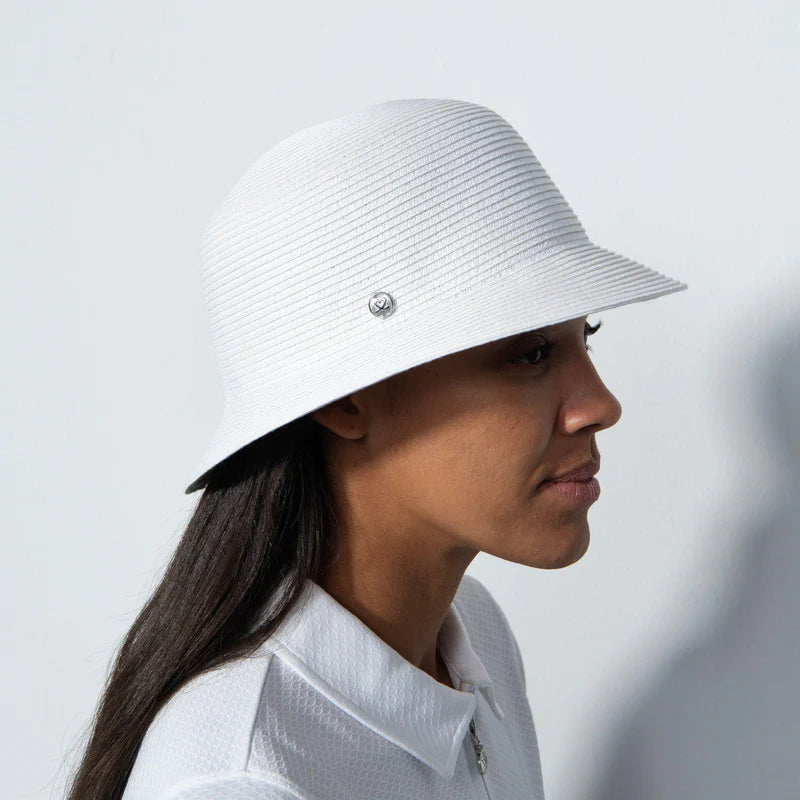 A woman wearing a Daily Sports  Dubbo ladies' golf hat with a narrow brim, in profile against a white background.