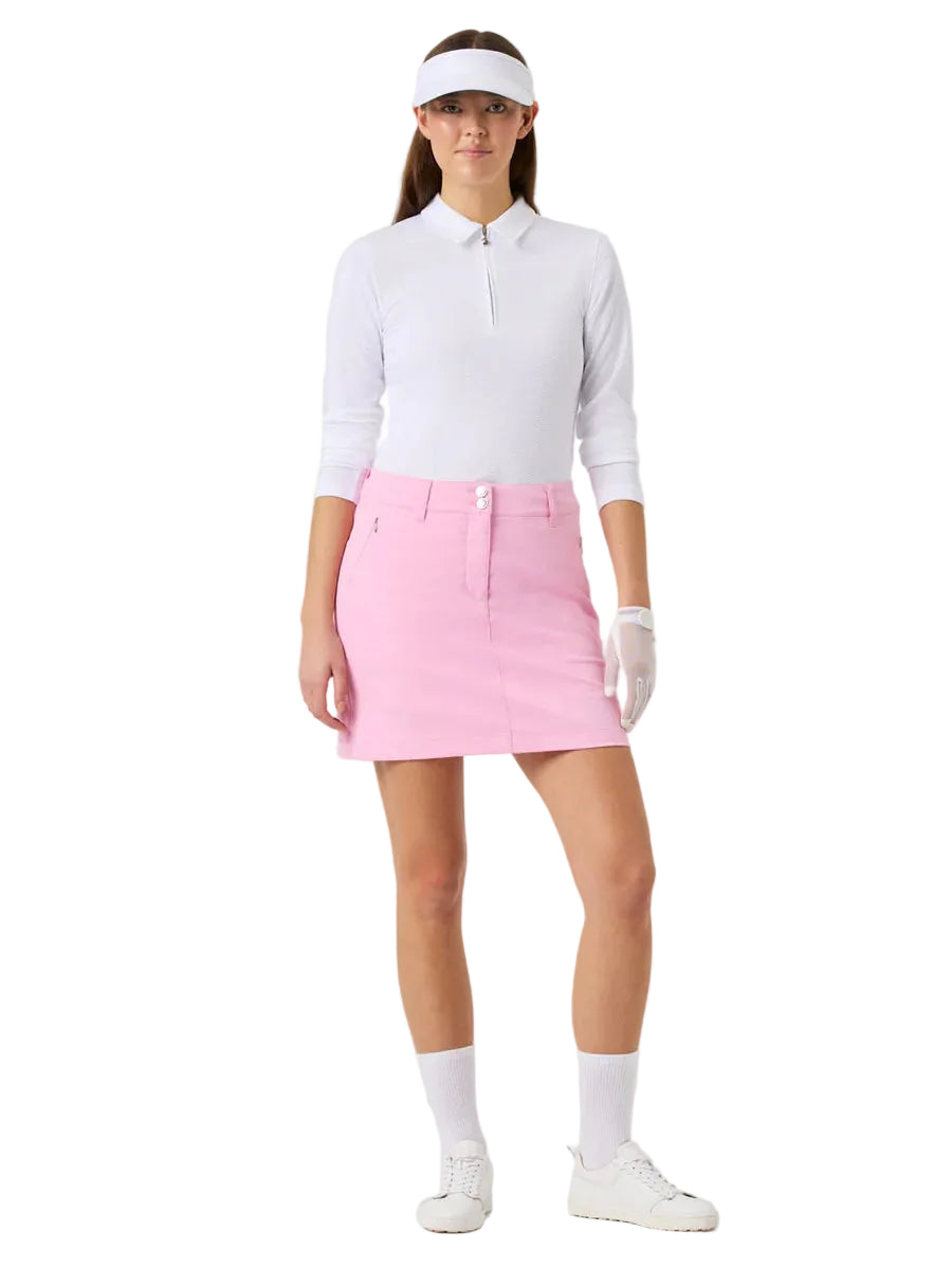 Daily Sports Women's Woven Golf Skort 42cm featuring lightweight woven fabric, built-in shorts, flattering fit, and polished golf styling.