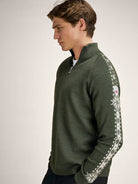 Dale of Norway Men's Geilo Sweater in Darkgreen Offwhite, a sporty Norwegian quarter-zip sweater made from 100% skin-soft merino wool.