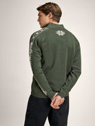 Dale of Norway Men's Geilo Sweater in Darkgreen Offwhite, a sporty Norwegian quarter-zip sweater made from 100% skin-soft merino wool.