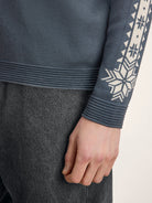 Dale of Norway Men's Geilo Sweater in Steel Offwhite, a sporty Norwegian quarter-zip sweater made from 100% skin-soft merino wool.