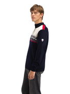 Dale of Norway Men's Liberg Sweater in Offwhite Raspberry featuring classic Norwegian-inspired styling and a quarter-zip neckline.