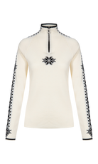 A white Dale of Norway Women’s Geilo turtleneck sweater made in Norway from luxurious Norweigan merino wool.
