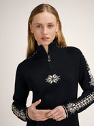Dale of Norway Women's Geilo Sweater in Black Offwhite, a slim-fit quarter-zip sweater made from 100% skin-soft merino wool.