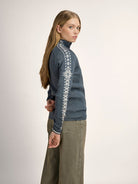 Dale of Norway Women's Geilo Sweater in Steel Offwhite, a slim-fit quarter-zip sweater made from 100% skin-soft merino wool.