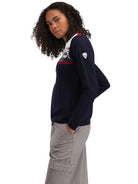 Dale of Norway Women's Liberg Sweater in Marine Raspberry Offwhite with colour-block design and classic Norwegian eight-petal rose pattern.
