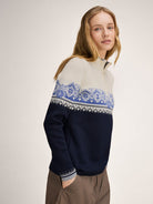 Dale of Norway Women's Moritz Sweater in Navy White Ultramarine with classic Nordic pattern and quarter-zip neckline.