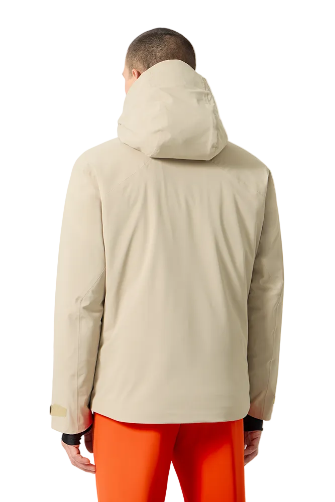 Rear view of a sand beige Descente Men's Josh Jacket featuring 4-way stretch Dermizax fabric, minimal seam construction, heat-sealed chest pocket, and underarm zip ventilation.