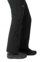 Side view of black Descente Women's Insulated Pants featuring 4-way stretch Dermizax fabric, S.I.O ergonomic articulation, adjustable waist tabs, and reinforced Cordura edge guards.