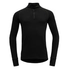 A black Devold Expedition Merino 235 Men’s Turtleneck Shirt that is made from moisture-wicking, lightweight, and warm merino wool.