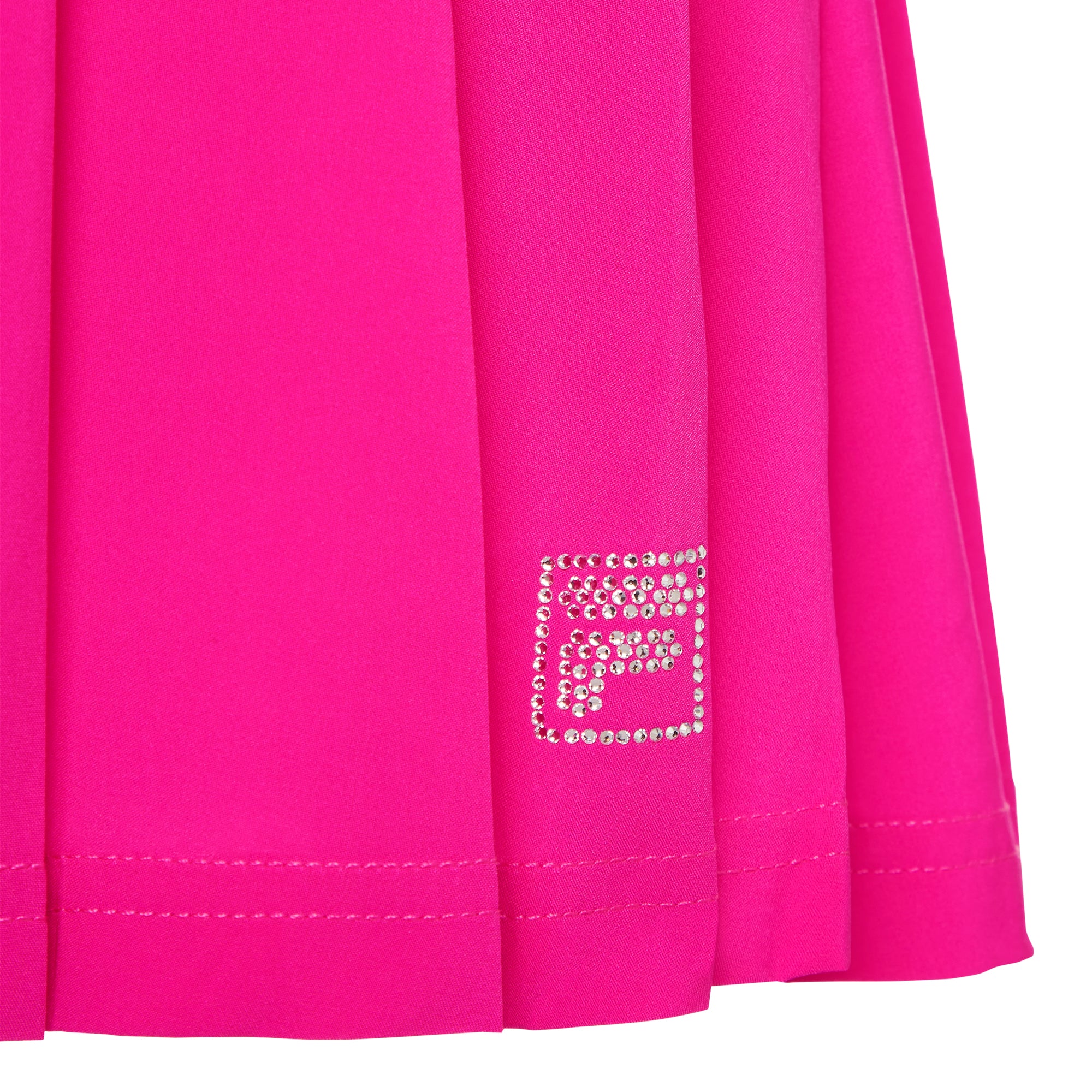 FILA Girls' Pleated Skort featuring lightweight performance fabric, built-in shorts, classic pleats, and an athletic fit.