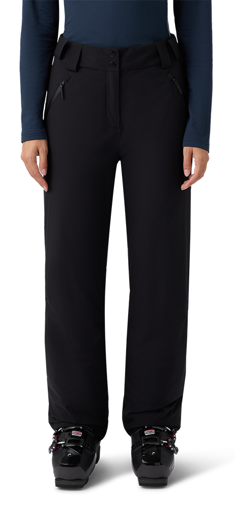 A pair of black Head Women’s Joy Pants showing waterproof breathable shell fabric, articulated knee construction, fully taped seams, adjustable waistband, side zippered pockets, and reinforced scuff guards at lower leg hems.
