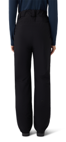A pair of black Head Women’s Joy Pants showing waterproof breathable shell fabric, articulated knee construction, fully taped seams, adjustable waistband, side zippered pockets, and reinforced scuff guards at lower leg hems.