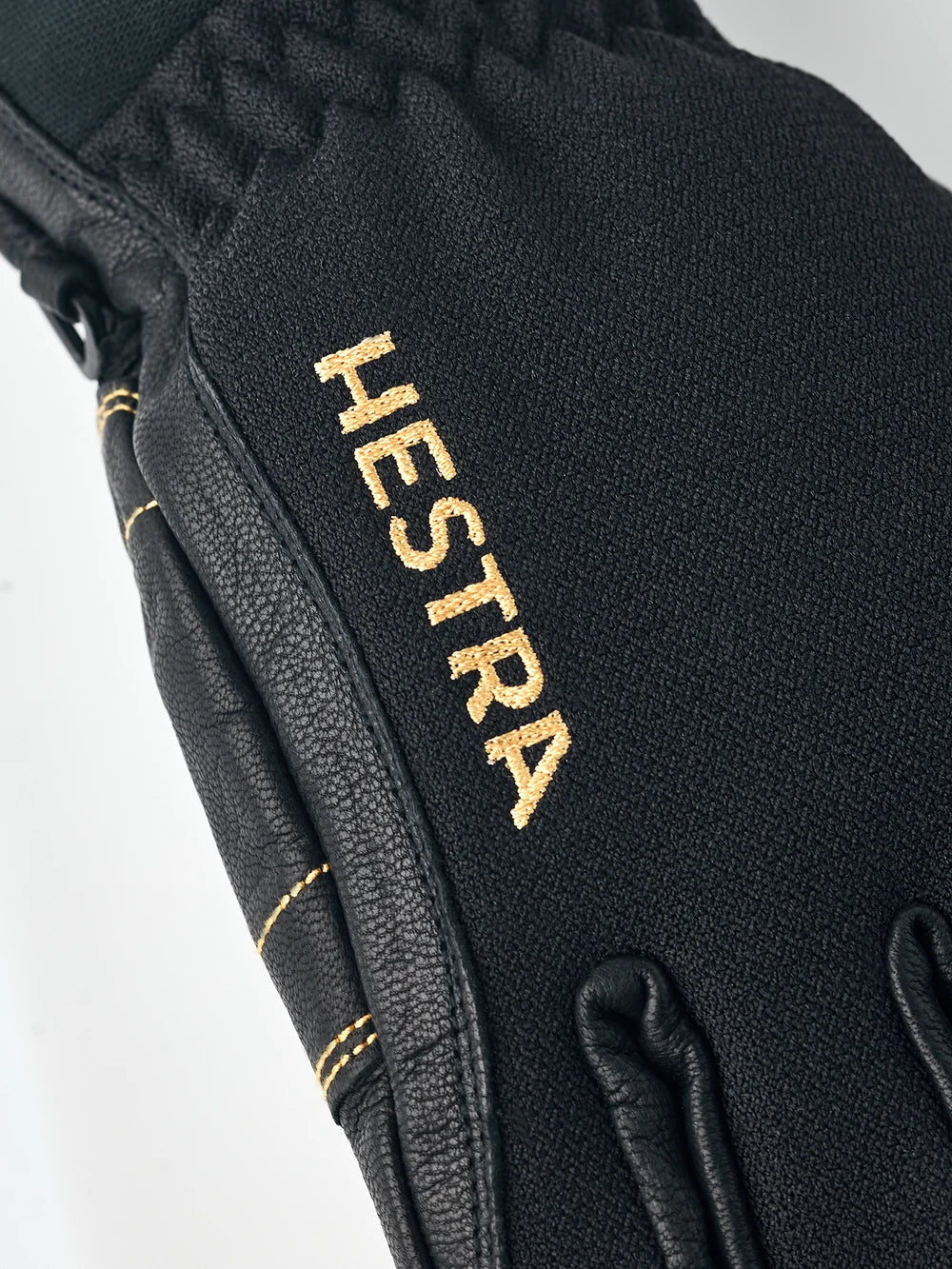 Hestra Army Leather GORE-TEX 5 Finger ski gloves with waterproof membrane, goat leather, G-Loft insulation and long snow-lock cuffs.