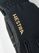 Hestra Army Leather GORE-TEX 5 Finger ski gloves with waterproof membrane, goat leather, G-Loft insulation and long snow-lock cuffs.
