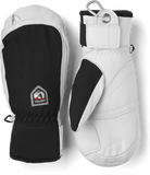 A pair of black and white Hestra Army Leather Patrol Mittens that are designed to keep your hadns warm and dry in harsh winter conditions.