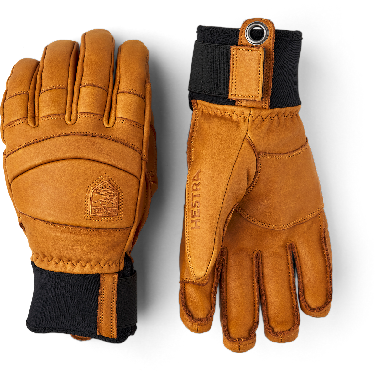 A pair of brown leather Hestra Fall Line Gloves made from premium materials.