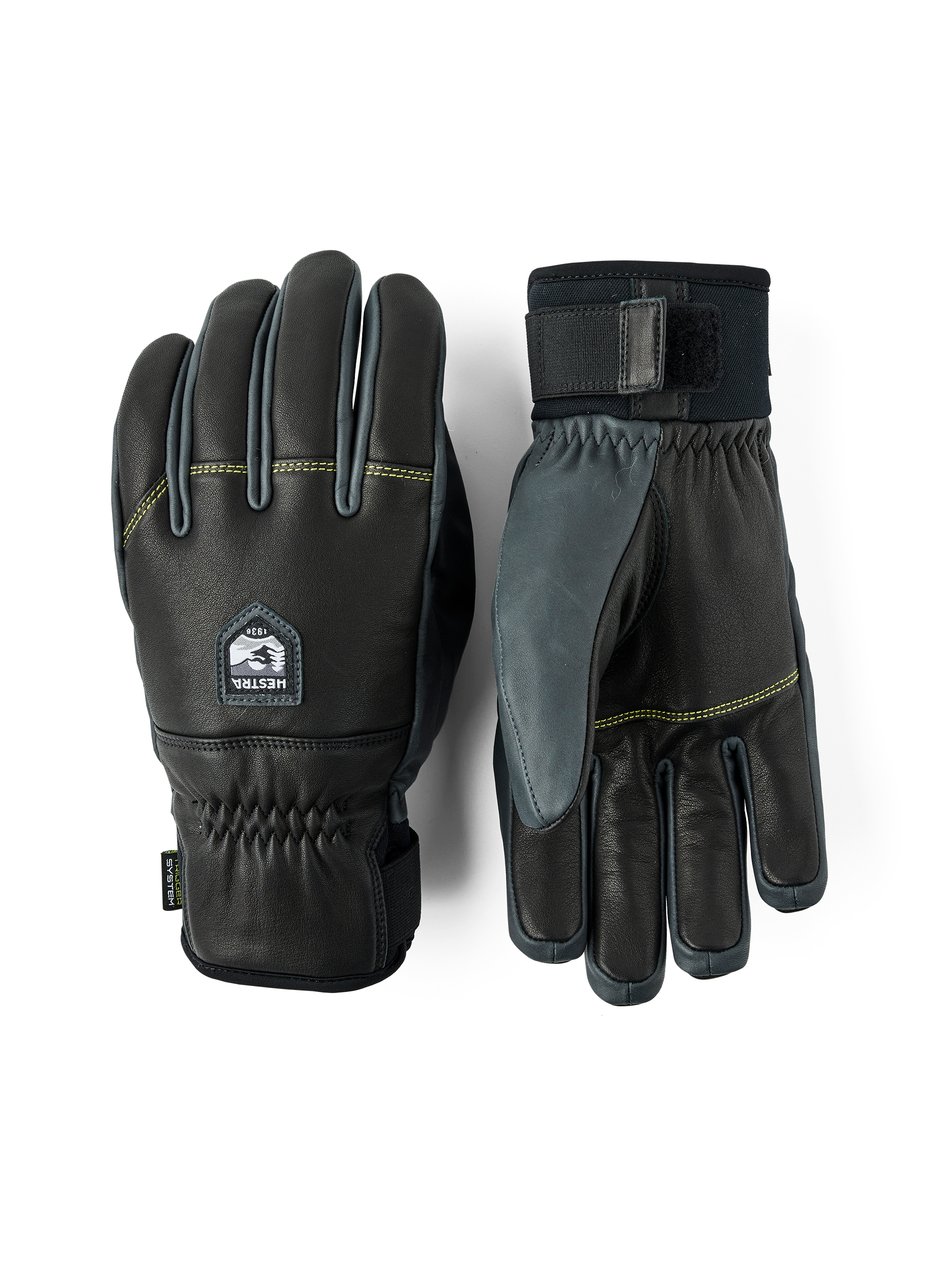 A pair of black Hestra Omni Trigger Gloves that are made from premium leather and feature a trigger loop for Leki Ski Poles.
