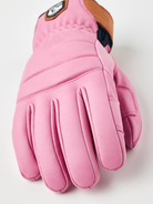 A pink Hestra Women's Fall Line Glove that is made from premium leather.