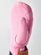 A pair of pink Hestra Women's Fall Line premium leather mittens.
