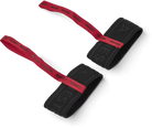 A pair of red and black HESTRA women's handcuffs designed to attach to ski or snowboard gloves.