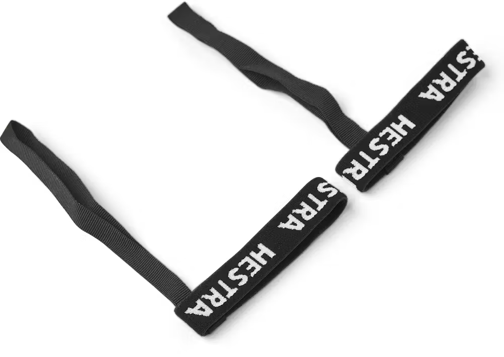 A pair of black Hestra Women’s Handcuffs Slim, which are designed to keep your gloves or mittens securely attached to your wrists.