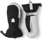A pair of black and white Hestra Women’s Patrol Gauntlet Mittens, which are designed to keep your hands war and dry in harsh winter conditions.