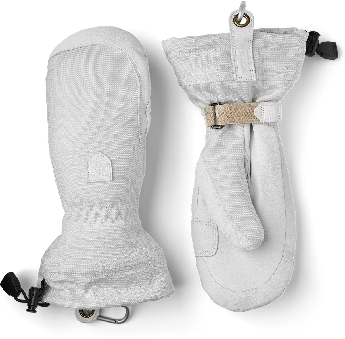 A pair of white Hestra Women’s Patrol Gauntlet Mittens, which are designed to keep your hands war and dry in harsh winter conditions.